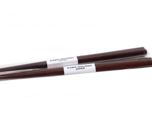 Lot #13108 – KAWS Holiday Japan Wood Chopsticks Set of 2 SEALED Art Toys [tag]