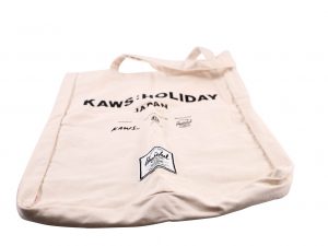 Lot #14402 – KAWS Holiday Japan Herschel Tote Bag Japan Only Various [tag]