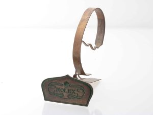 Lot #14248 – Rolex Metal Display Watch Stand Collector Vintage Rarities Rolex Watch Stand
