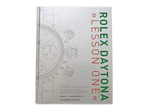 Lot #14839 – Rolex Daytona Lesson One by Christie’s Auction Catalog Book Collector's Bookshelf Rolex Daytona Lesson One
