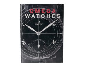 Lot #14844 – Omega Watches Book By John Goldberger Sealed Collector's Bookshelf John Goldberger