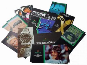 Lot #14774b – Rolex Submariner Brochures Green Anchor Explorer Lot Collector's Bookshelf Rolex