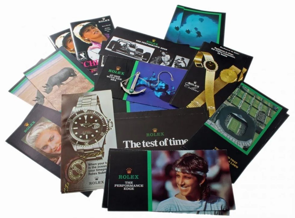 Lot #14774b – Rolex Submariner Brochures Green Anchor Explorer Lot Collector's Bookshelf Rolex