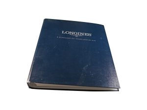 Lot #HB10-15 – Longines Master Dealer Watch Catalog Collector's Bookshelf [tag]