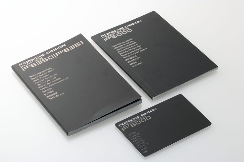 Lot #HB19-54 – Porsche Design Watch Warranty Card Manual Accessories Porsche Design Warranty Card