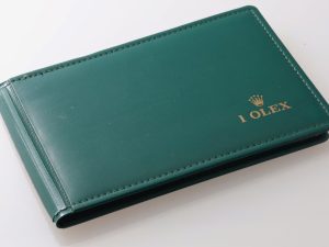 Lot #HB31-006 – Vintage Rolex Green Leather Photograph Book Wallet Rolex Book Wallet