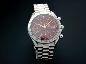 Lot #AN3818 – Rare Unusual Omega Speedmaster Date Watch Oxblood Dial 3511.61 Watches Acquire Now