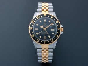 Lot #AN3911 – Rolex GMT Master Tutone Watch 16753 Watches Acquire Now